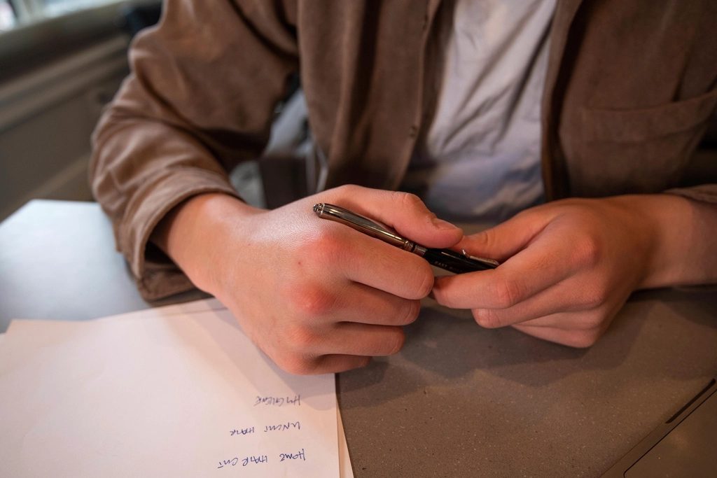 Business owner reviewing insurance renewal paperwork